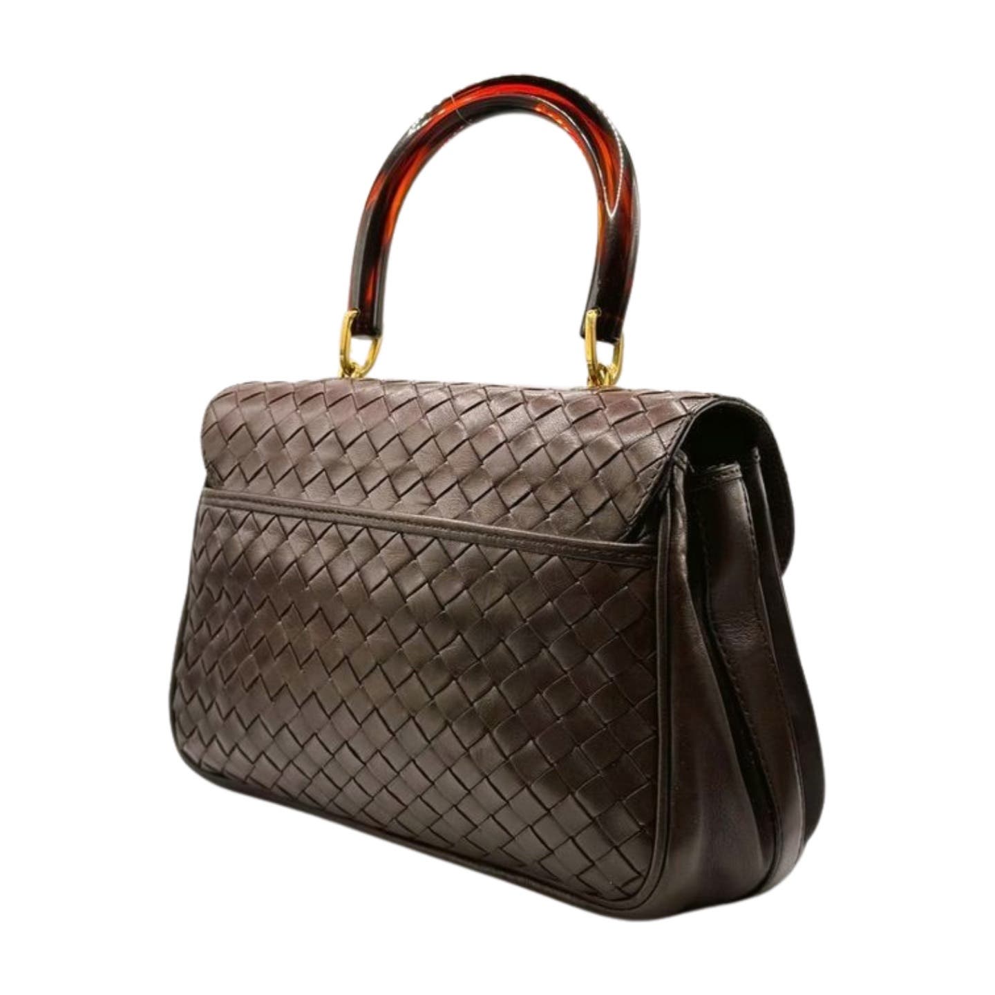A stylish Bottega Veneta Intrecciato Top Handle Bag featuring an intrecciato woven pattern on its main body. It is complemented by sturdy handles made of a semi-transparent, dark amber material with gold-tone hardware. The handbag has a structured shape with a slightly curved top edge.