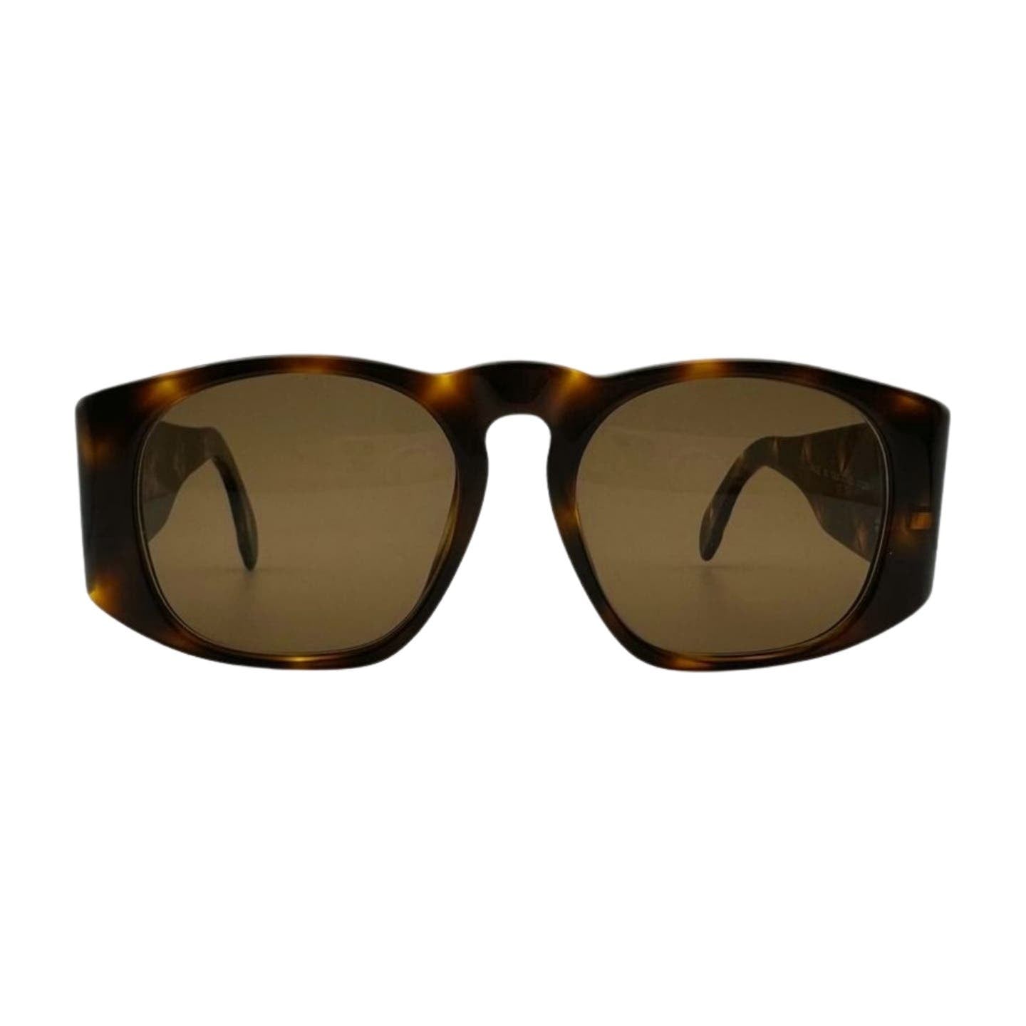 A pair of brown tortoiseshell Vintage 90’s Chanel Sunglasses with a wide frame and dark lenses, featuring elegant quilted arms, viewed from the front against a plain background.