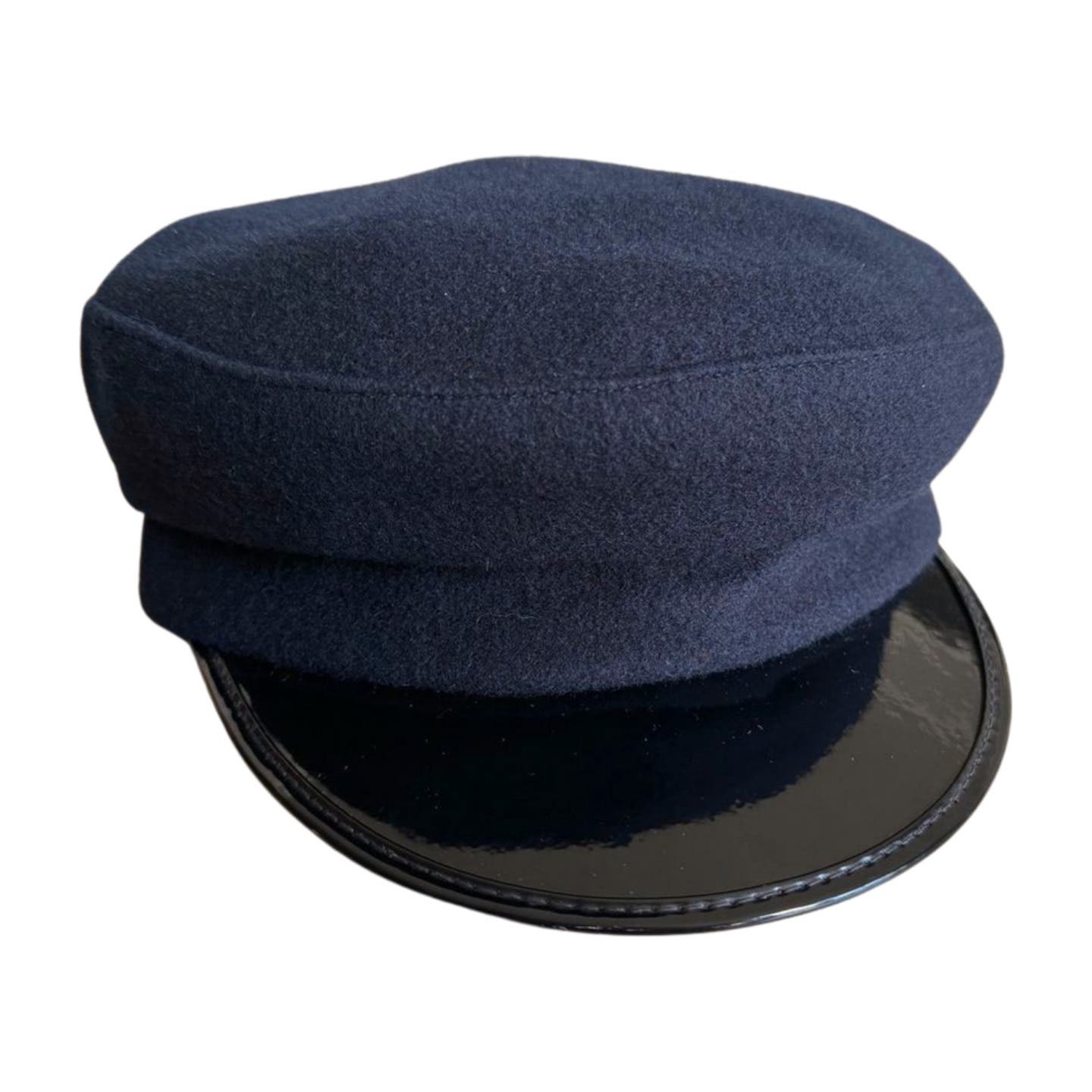 A Bloomingdale's Vintage Bloomingdale's Fishermen Hat in dark navy blue woolen fabric with a glossy black visor. The vintage hat has a simple, classic design without any additional decorations or logos, reminiscent of timeless styles found at Bloomingdale's.